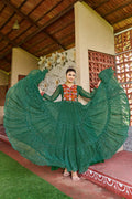 Green georgette Navaratri gown featuring Bandhani print and colorful Kutchi patch-work details
