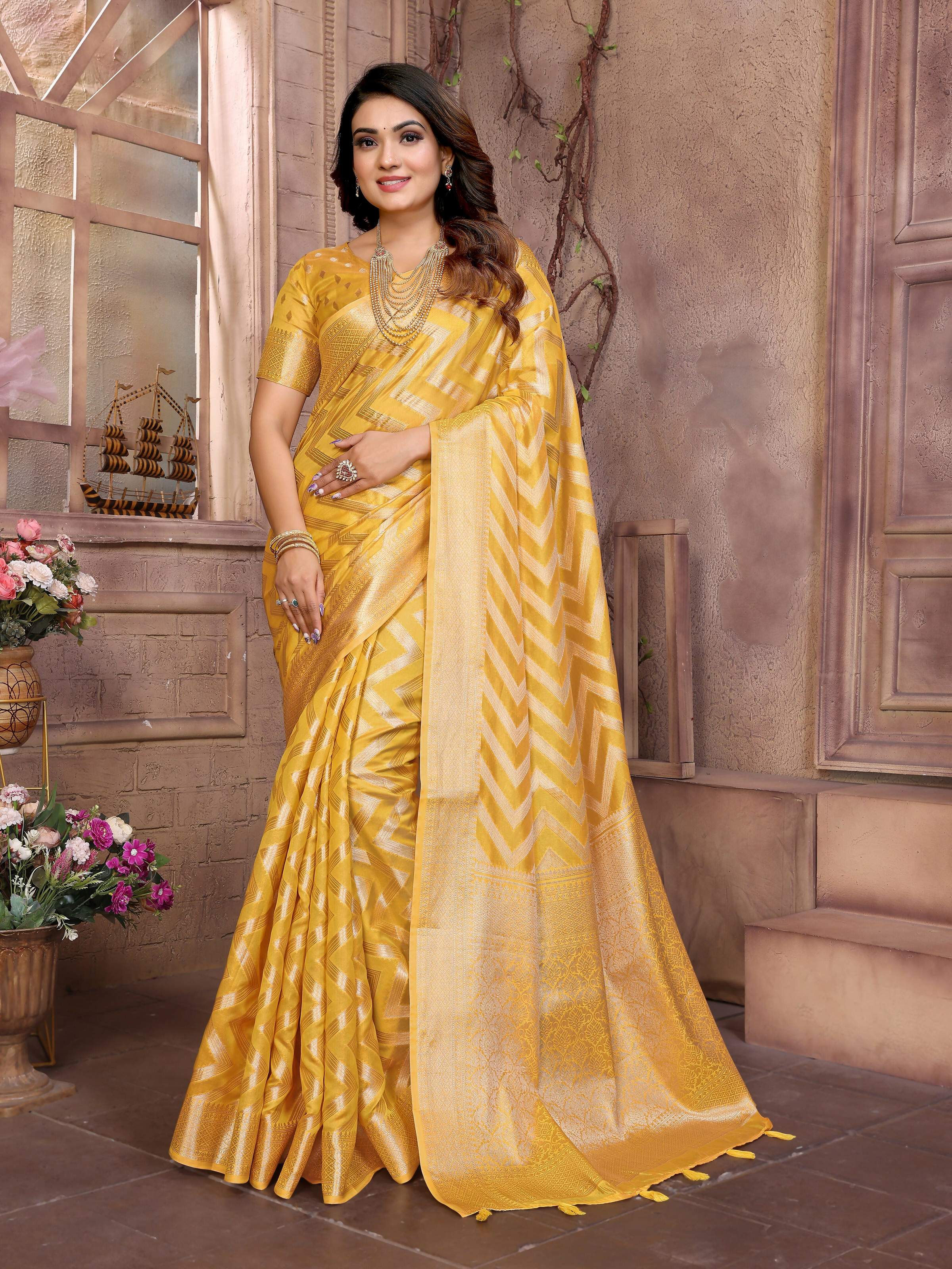 Aastha Fashion Yellow Soft Organza Silk Weaving Saree with detailed weave texture