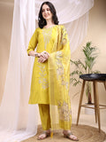 Woman wearing a yellow Chanderi embroidered kurta with pants and a printed dupatta