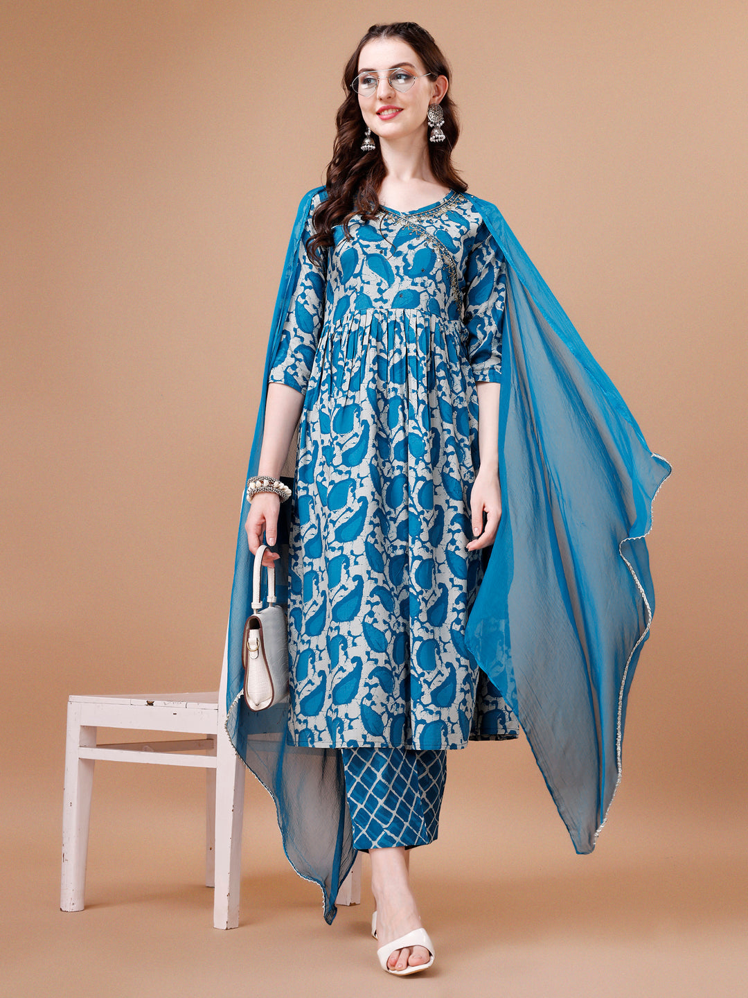 Woman wearing a multicolor embroidered Angrakha-style Anarkali kurta set with matching pants and dupatta
