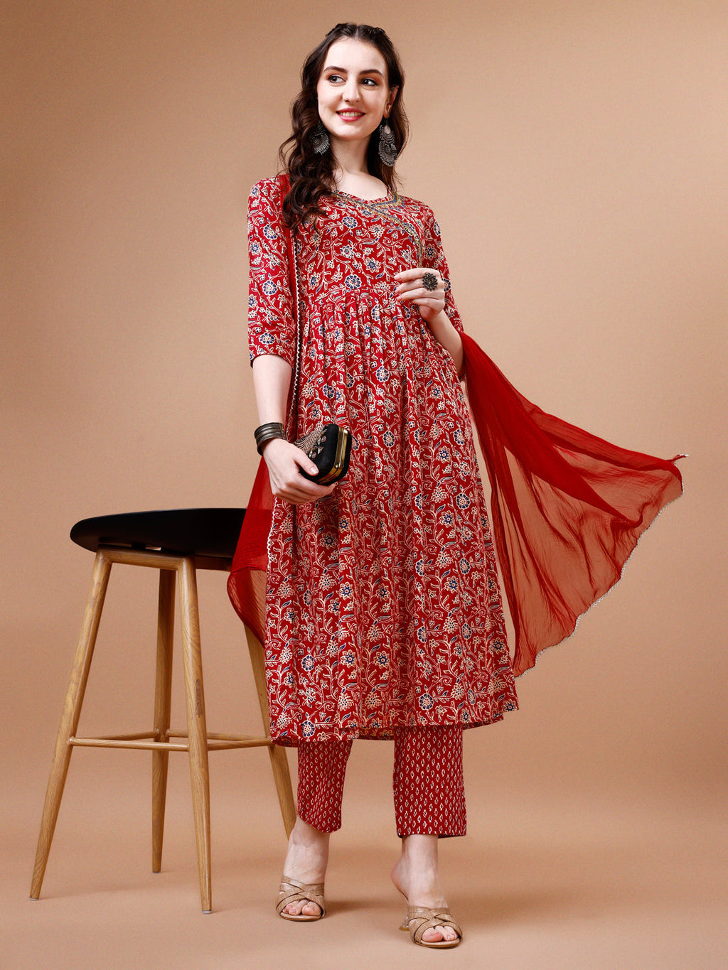 A multicolor Angrakha-style flared Anarkali kurta set with mirror embroidery, matching pants, and a dupatta.