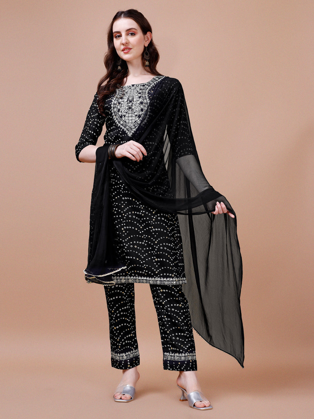 Multicolor Bandhani printed kurta set with embroidery detail, matching pants, and dupatta.