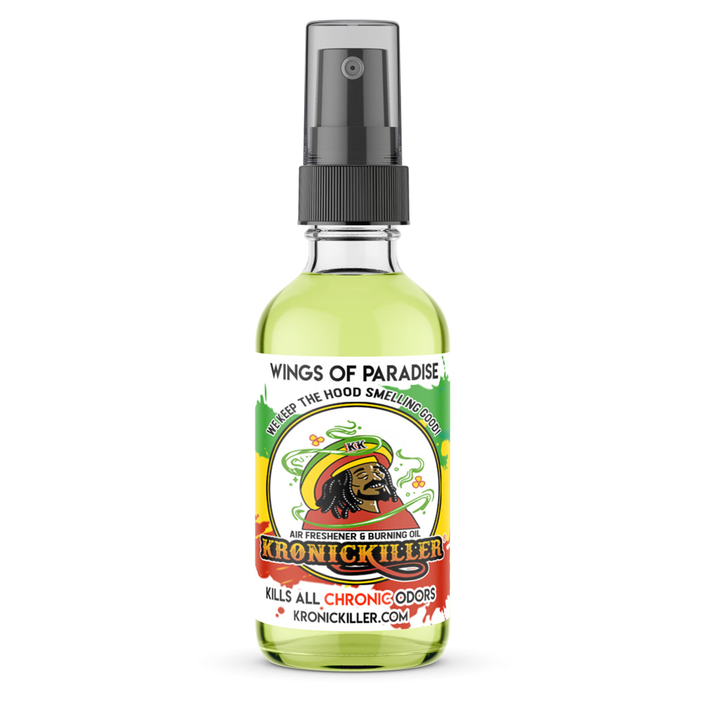 Bottle of Wings of Paradise air freshener and burning oil spray with citrus and coconut scent
