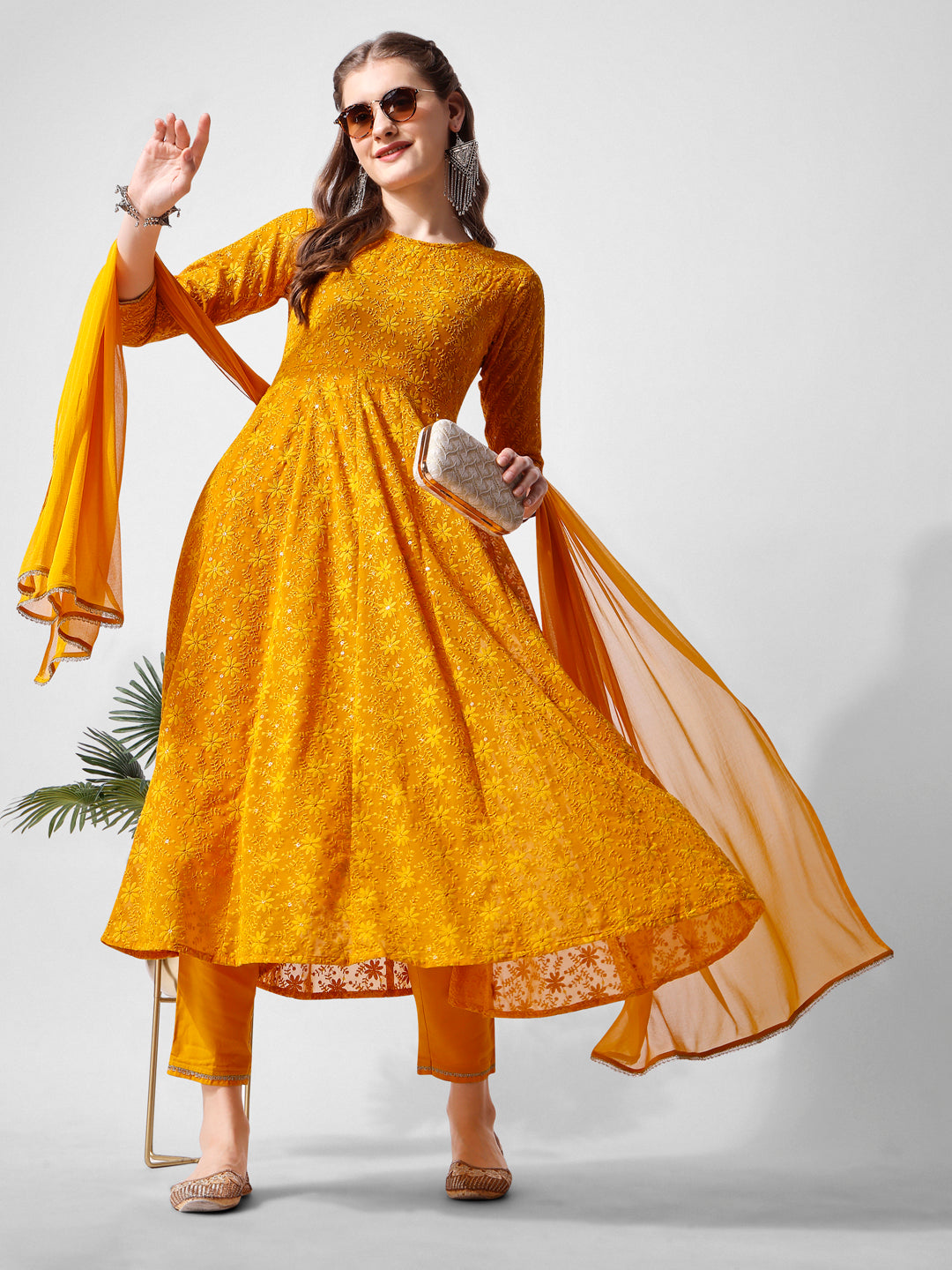 Mustard georgette flared kurta with intricate schiffly embroidery, pant, and dupatta