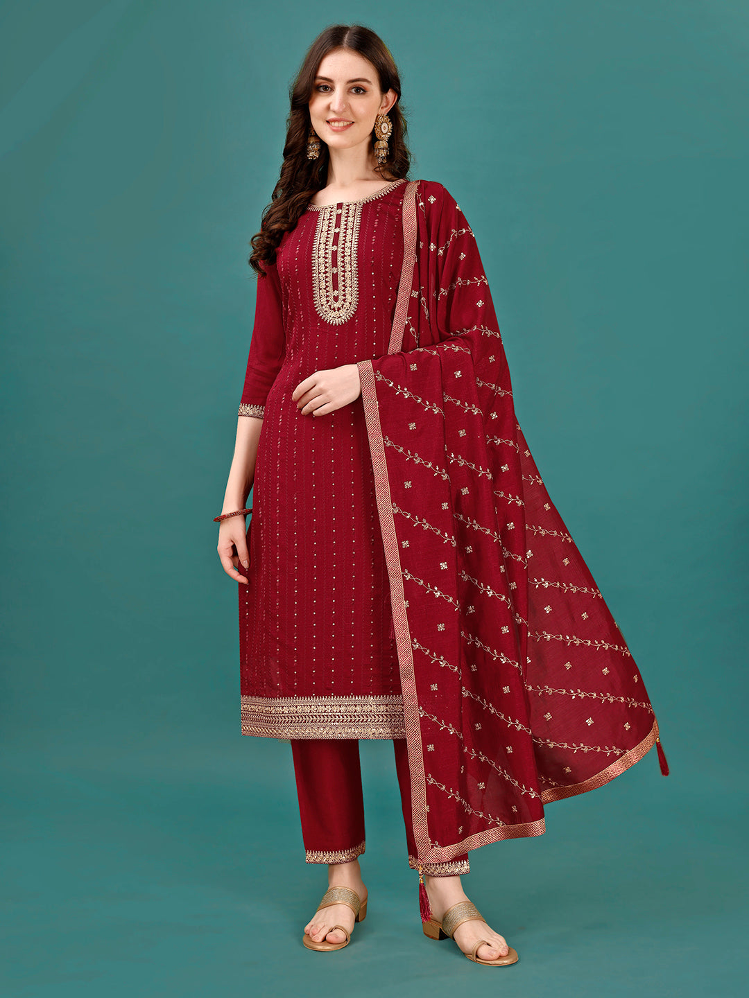 Multicolor sequined embroidered straight kurta set with matching trousers and dupatta on a model