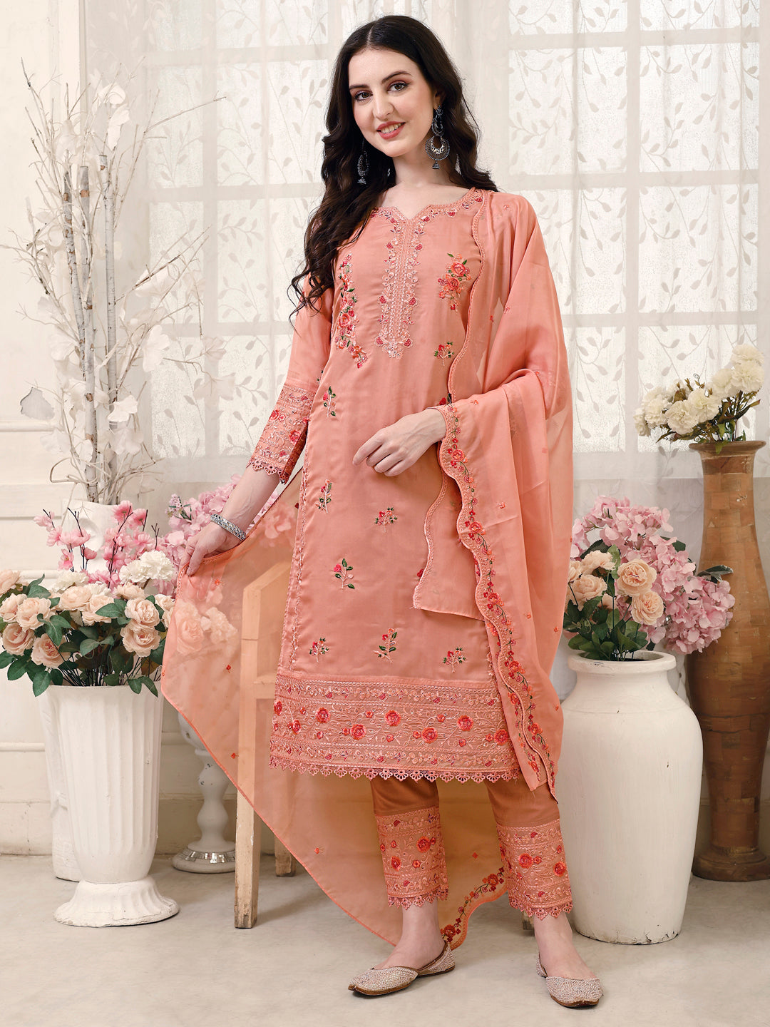 Multicolor luxury Pakistani embroidered kurta set with matching embroidered pants and dupatta.