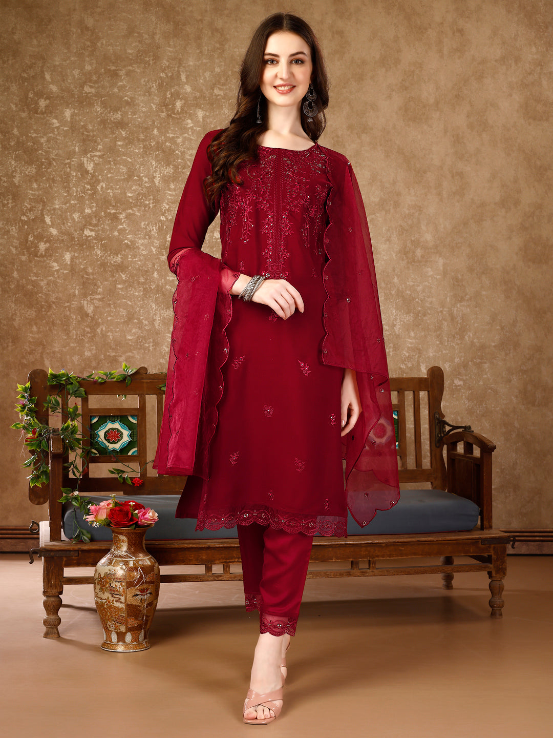 A luxury Pakistani style multicolor sequined embroidered kurta set with a matching dupatta.
