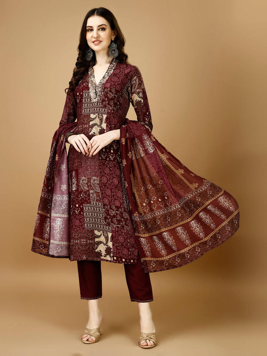 Multicolor printed kurta set with hand embroidery, featuring matching pant and dupatta