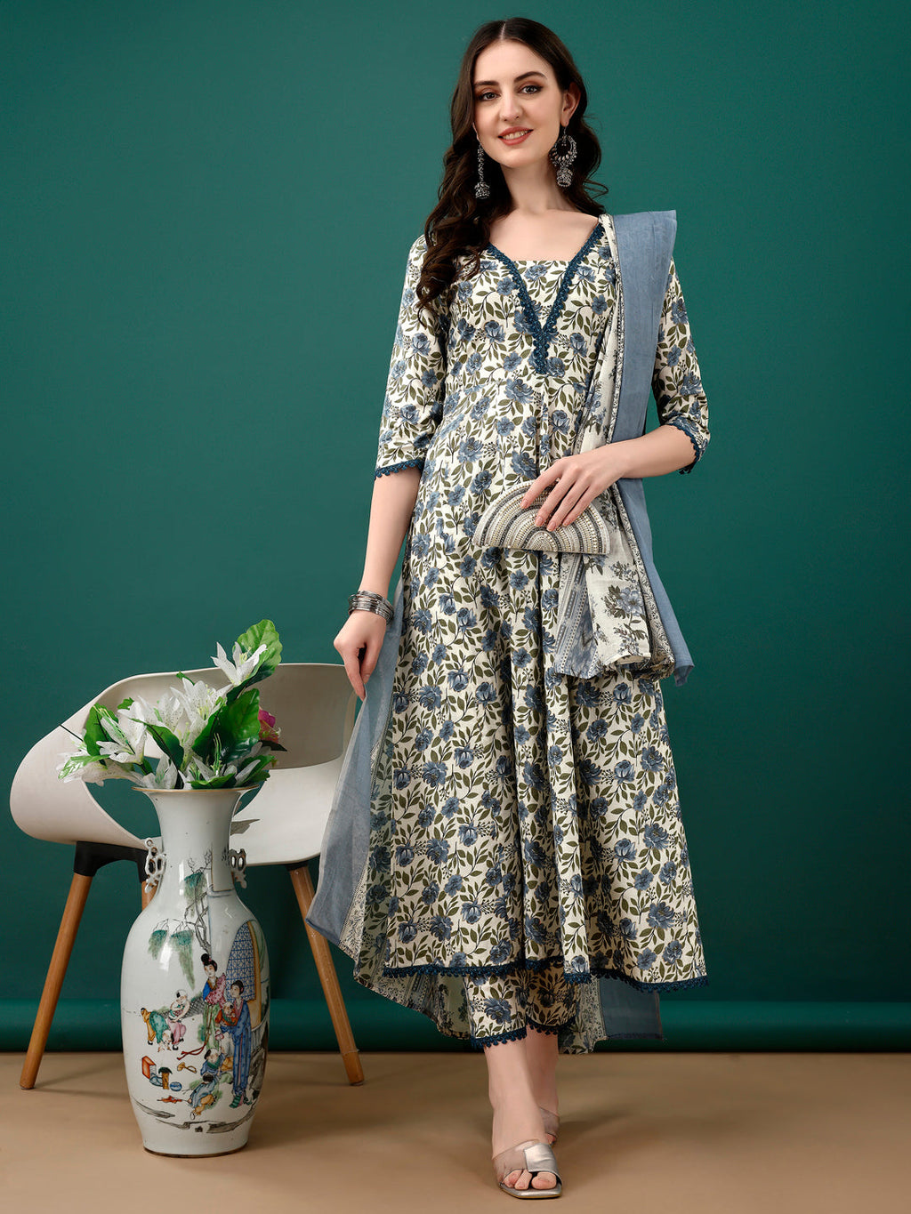 Navy blue cotton Anarkali kurta with floral print featuring matching pants and a dupatta.