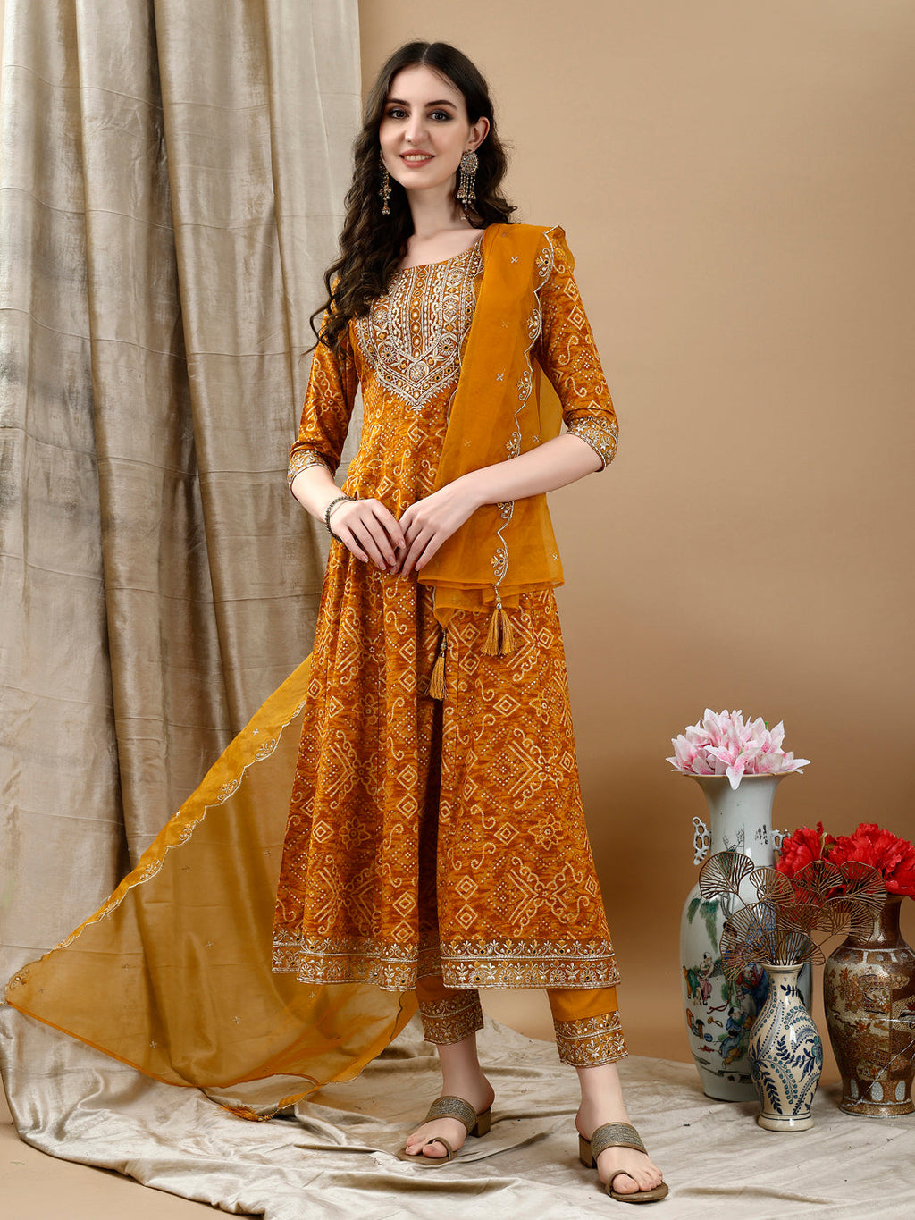Mustard Bandhani printed flared rayon kurta with pants and dupatta