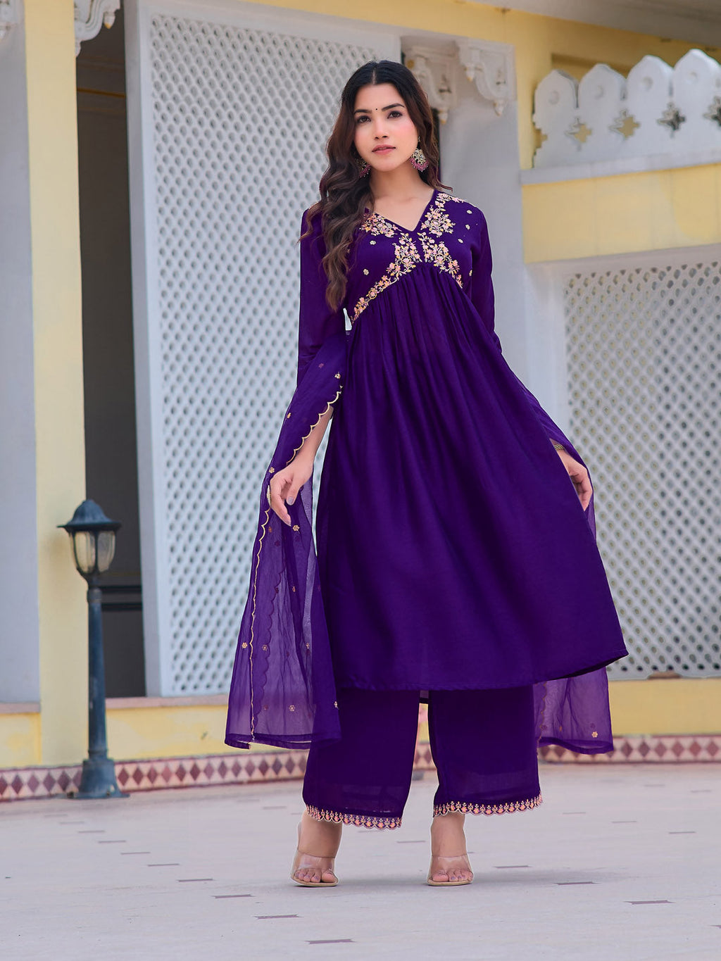 Elegant purple Alia cut silk kurta set with intricate embroidery, paired with pants and a matching dupatta.