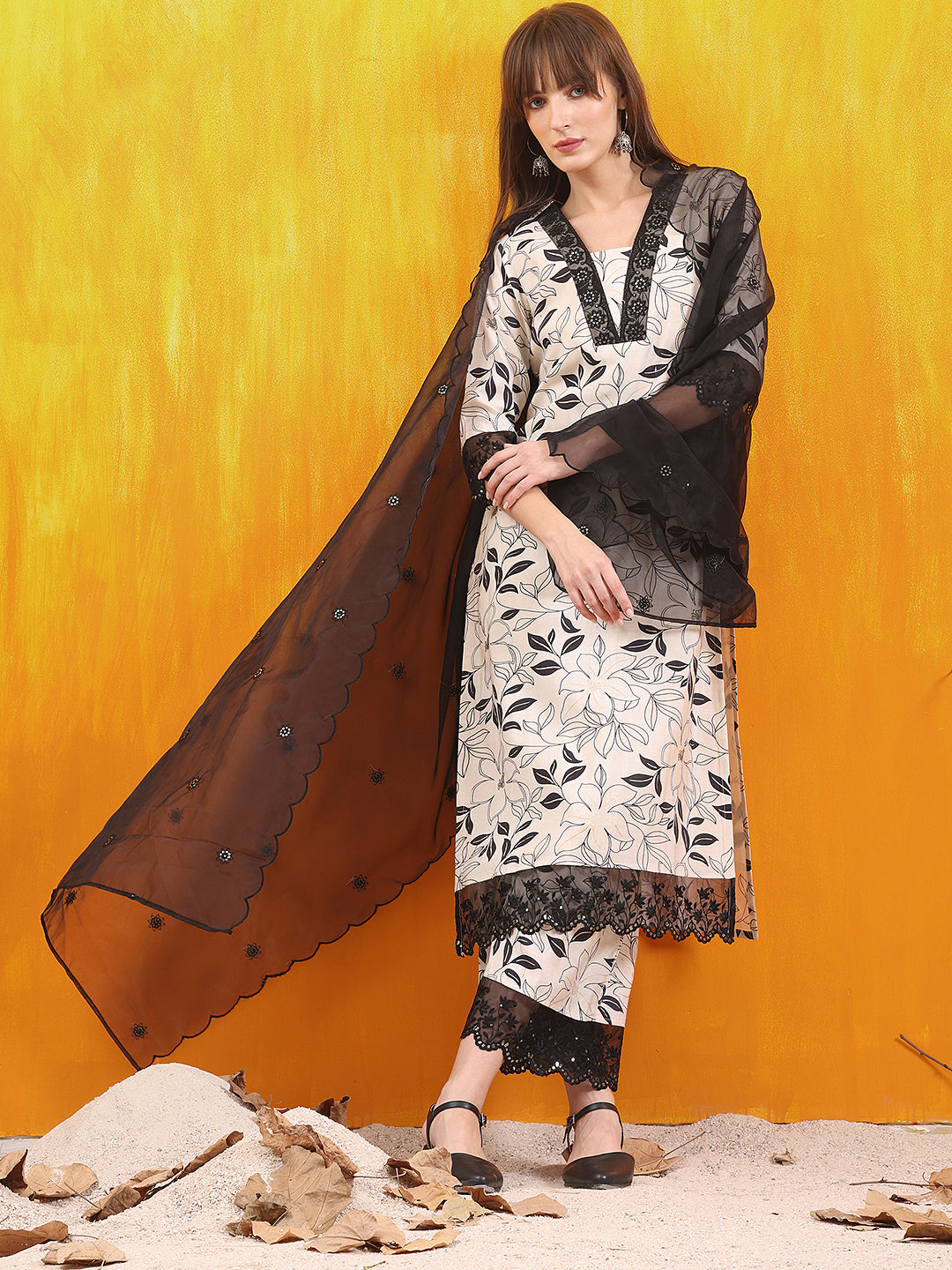 White Chanderi kurta with floral embroidery and lace detailing, paired with palazzo pants and dupatta