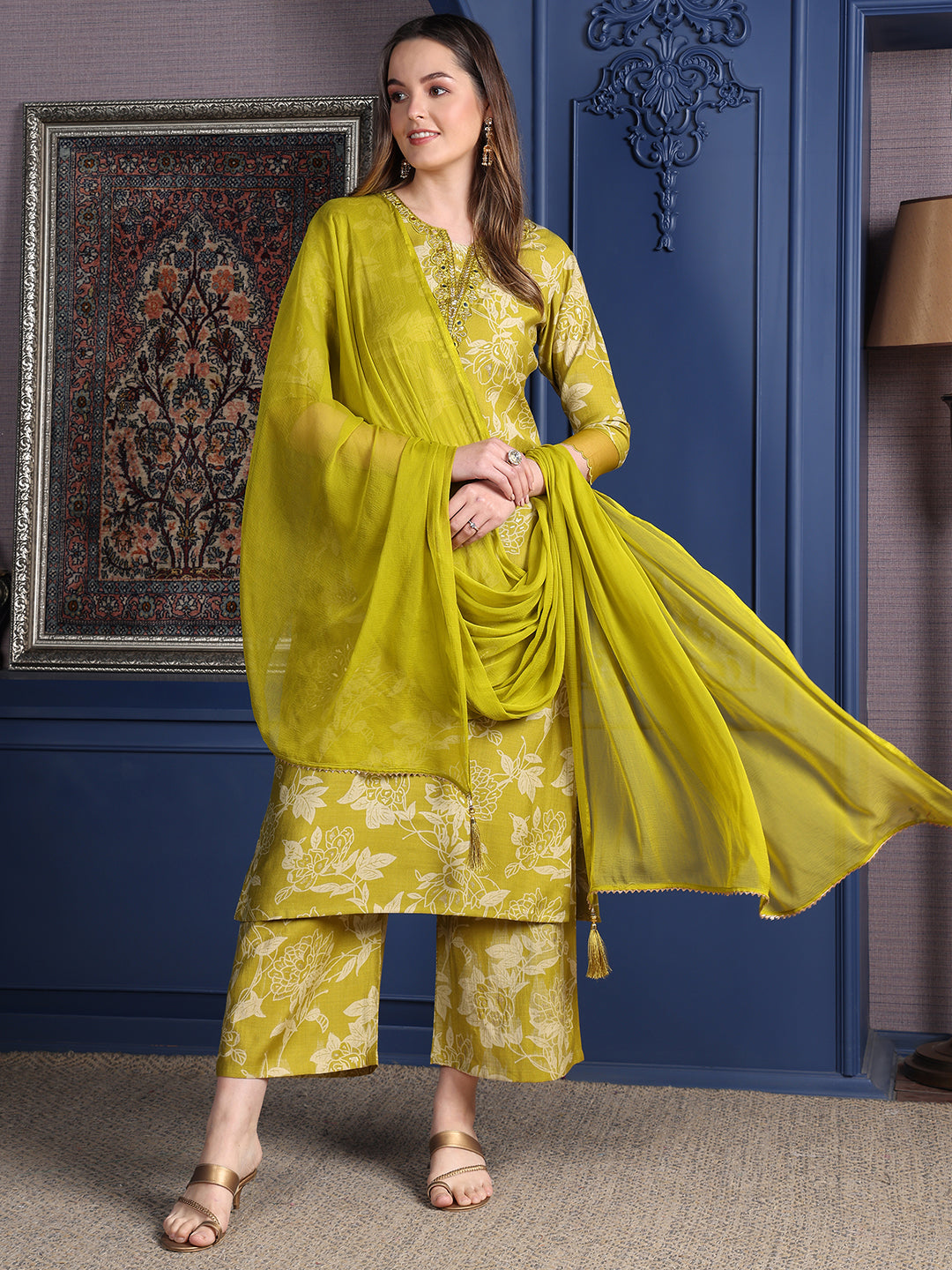 Green rayon kurta set featuring intricate embroidery, matching palazzo, and dupatta.