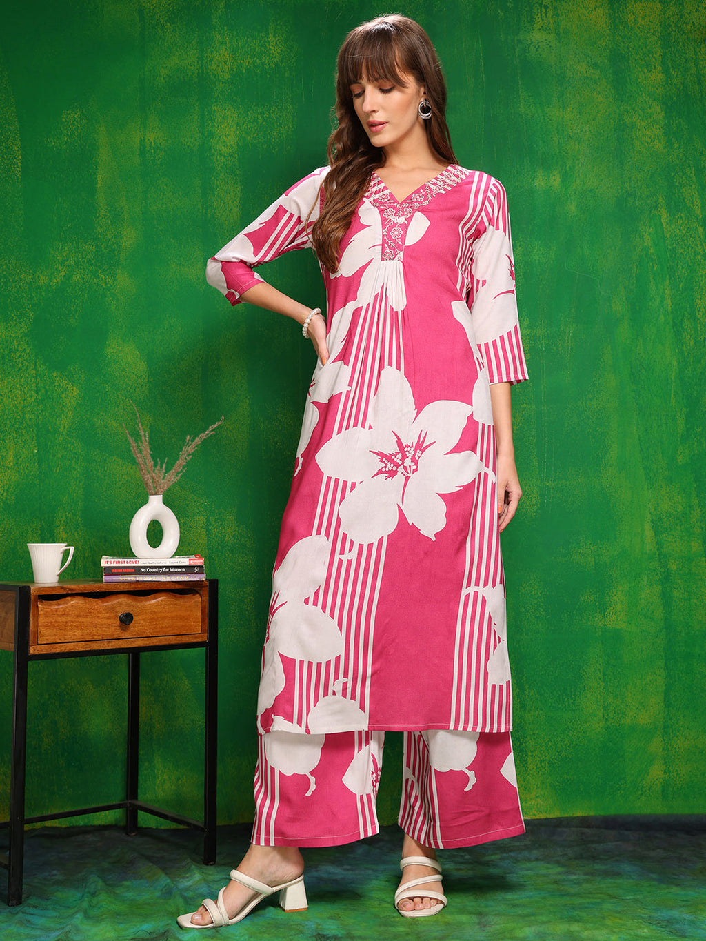 Pink floral printed embroidered kurta paired with matching palazzo pants