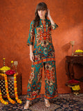 Model wearing a Teal ethnic printed co-ord set featuring a V-neck tunic and matching palazzo pants