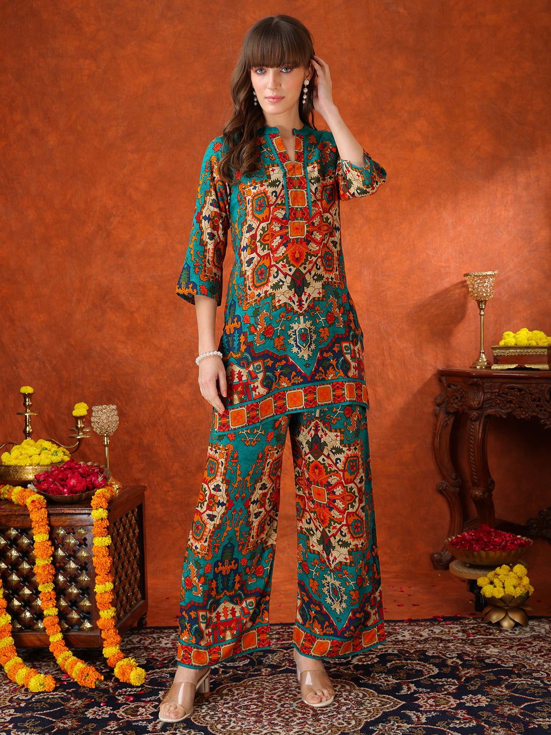 Model wearing a Teal ethnic printed co-ord set featuring a V-neck tunic and matching palazzo pants
