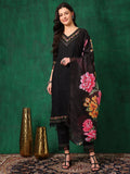 Model wearing a black Chikankari kurta with matching pants and a printed dupatta