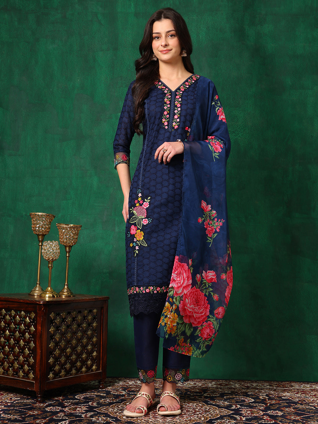 Navy Blue cotton kurta with applique embroidery, paired with pants and matching dupatta.