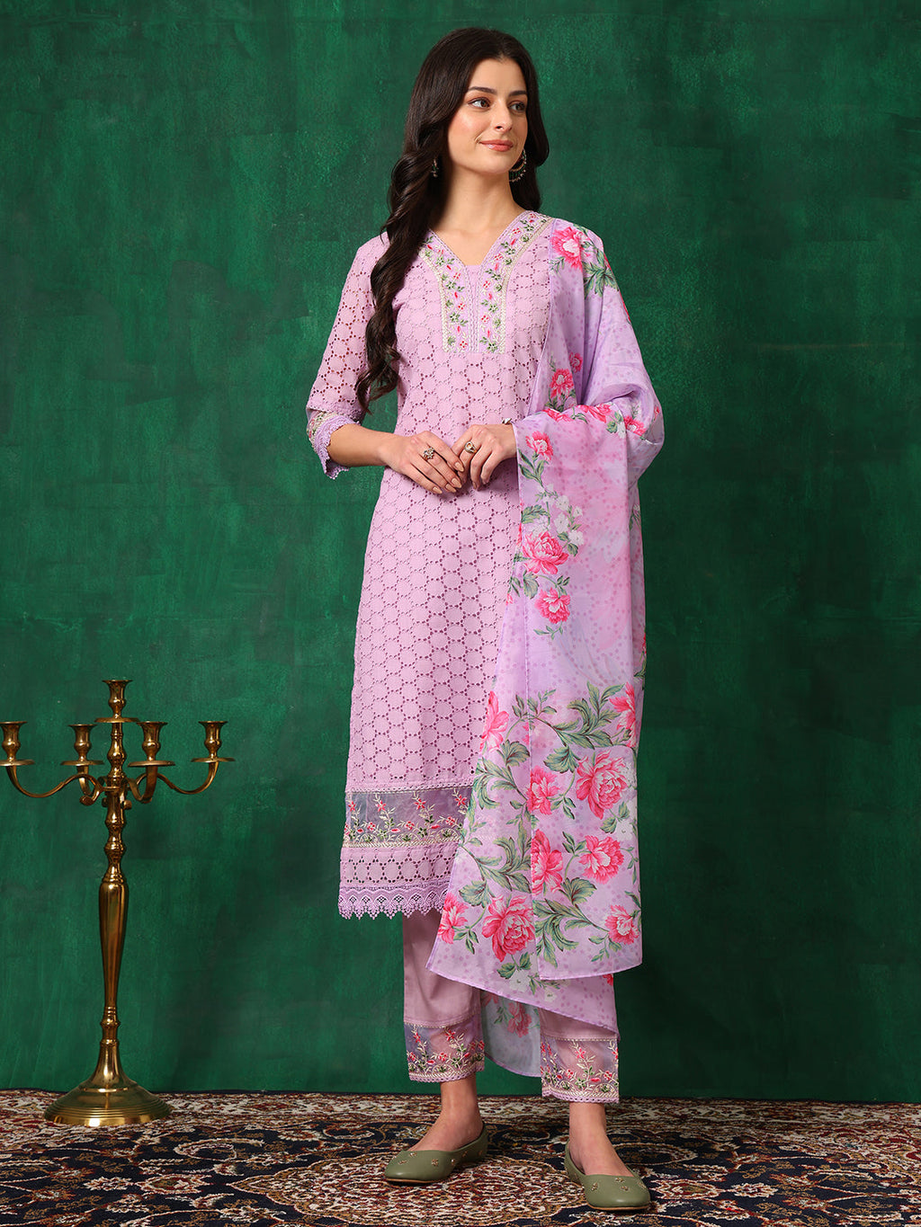 Lavender Chikankari embroidered kurta set with matching pants and dupatta worn by a woman.