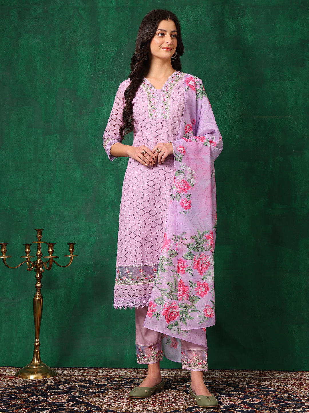 Lavender Chikankari embroidered kurta set with matching pants and dupatta worn by a woman.