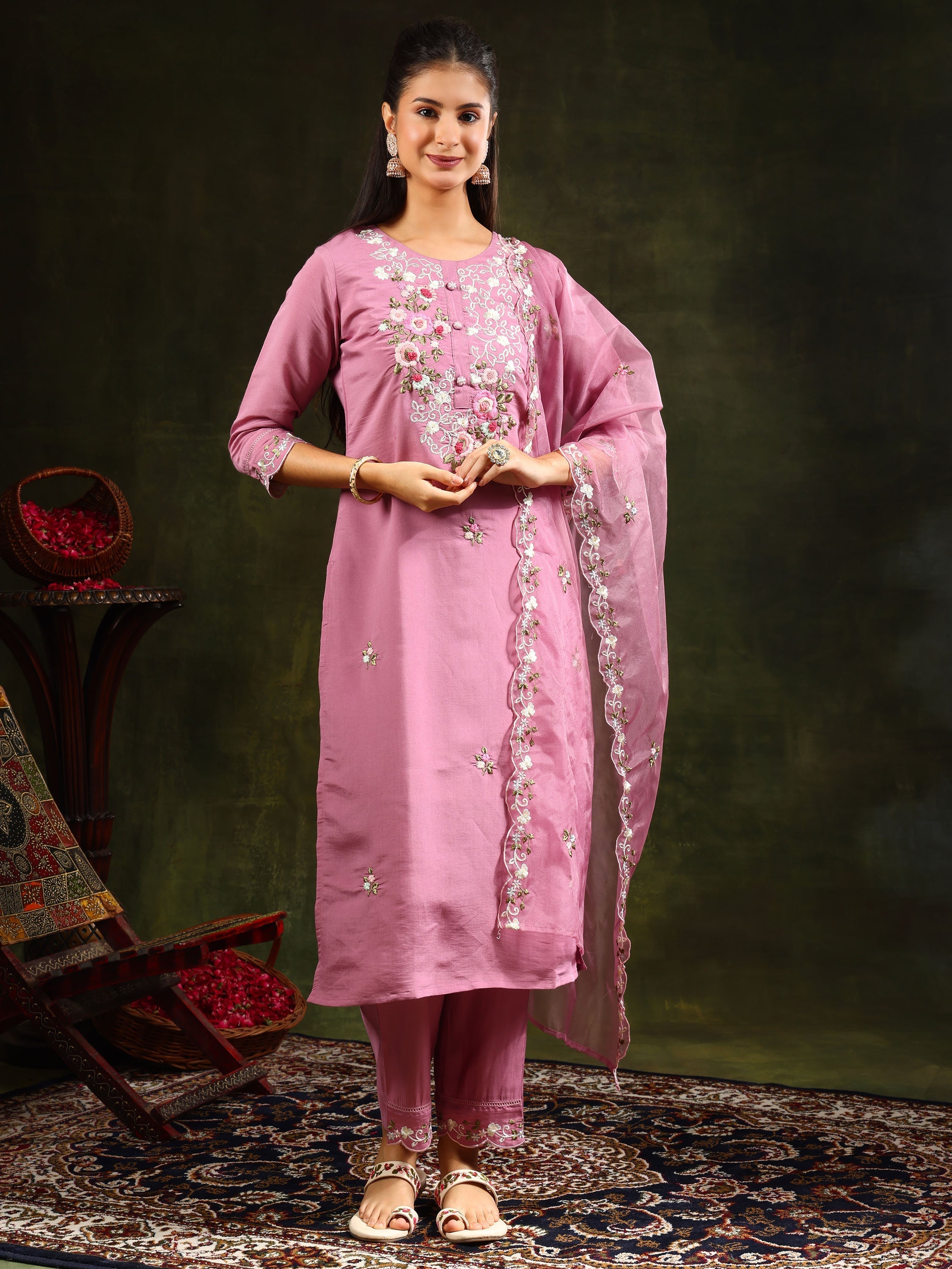 Sophisticated pink Chanderi kurta set with delicate embroidery, 3/4th sleeves, matching pants, and an organza dupatta.