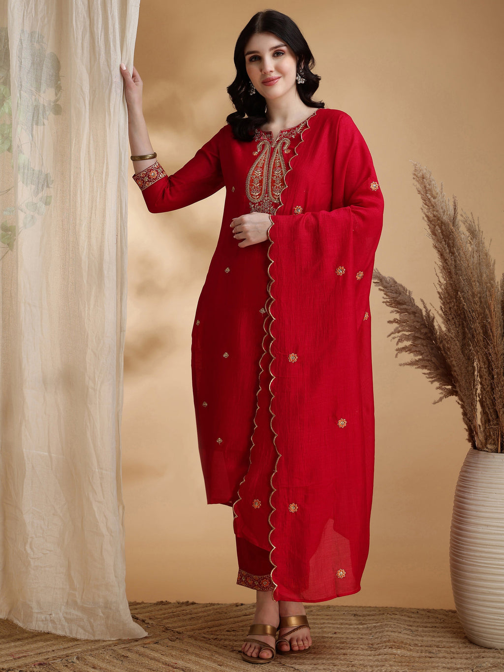 Pink silk kurta set with detailed embroidery and matching dupatta
