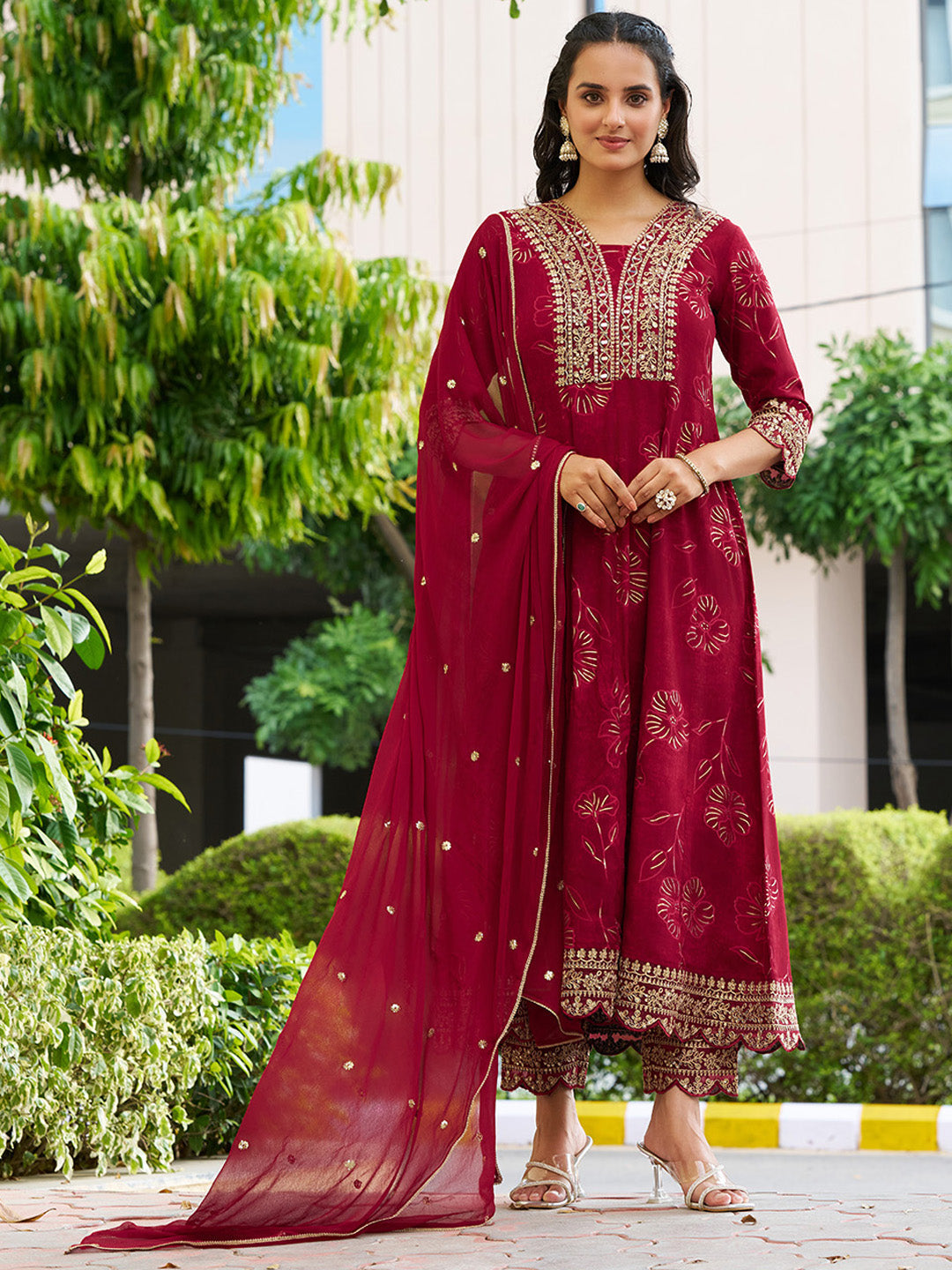 Maroon Anarkali kurta with mirror embroidery, matching pants, and a chiffon dupatta.