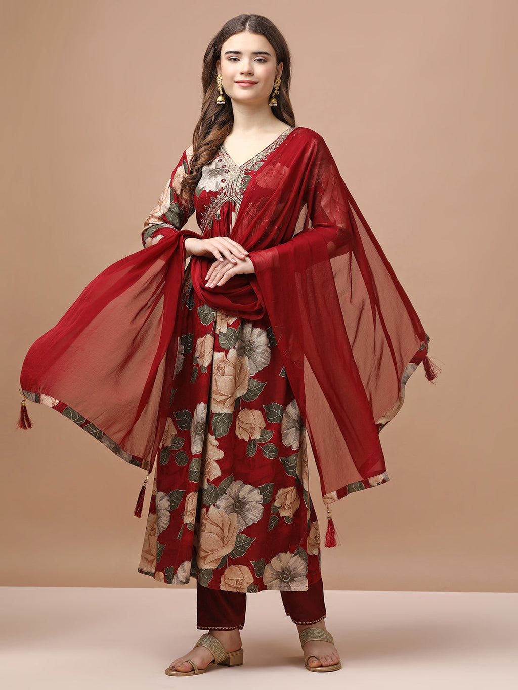 Multicolor Alia cut rayon kurta with floral print and embroidery featuring matching pants and dupatta.