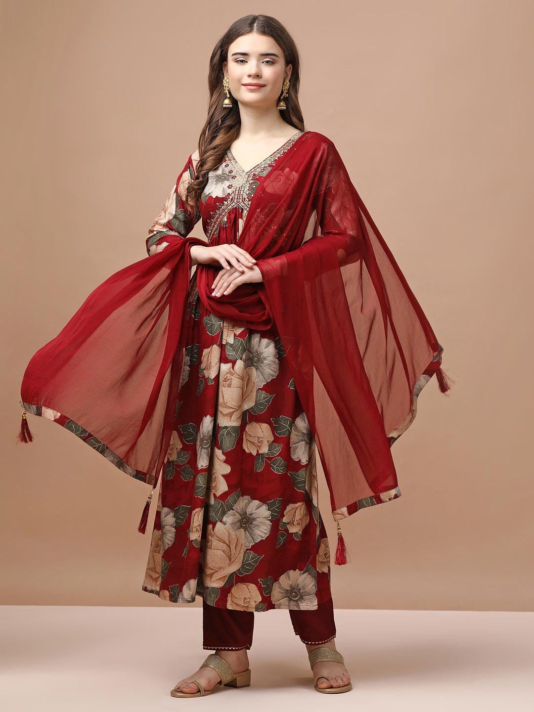 Multicolor Alia cut rayon kurta with floral print and embroidery featuring matching pants and dupatta.