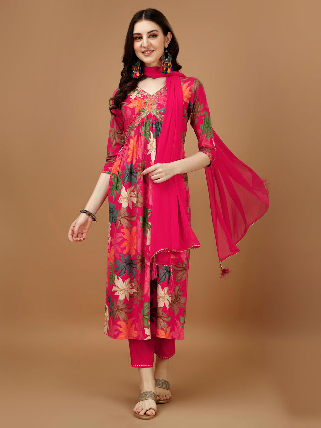 A beautiful multicolored floral printed Alia cut kurta set with matching pants and dupatta.
