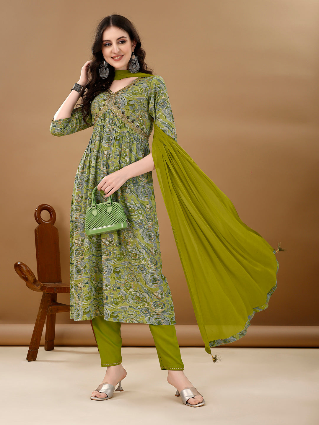 Multicolor Alia cut floral kurta set with intricate embroidery, paired with pants and a matching dupatta.
