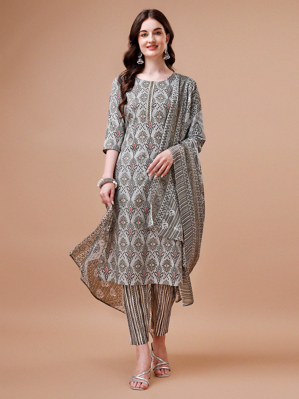 Multicolor printed rayon kurta set featuring 3/4th sleeves with matching pants and dupatta.