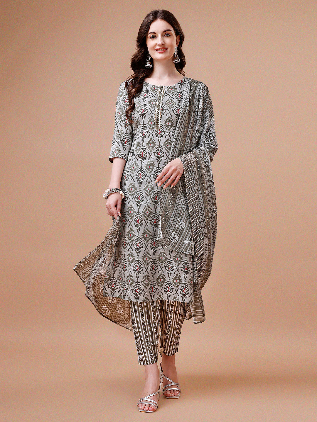 Multicolor printed rayon kurta set featuring 3/4th sleeves with matching pants and dupatta.