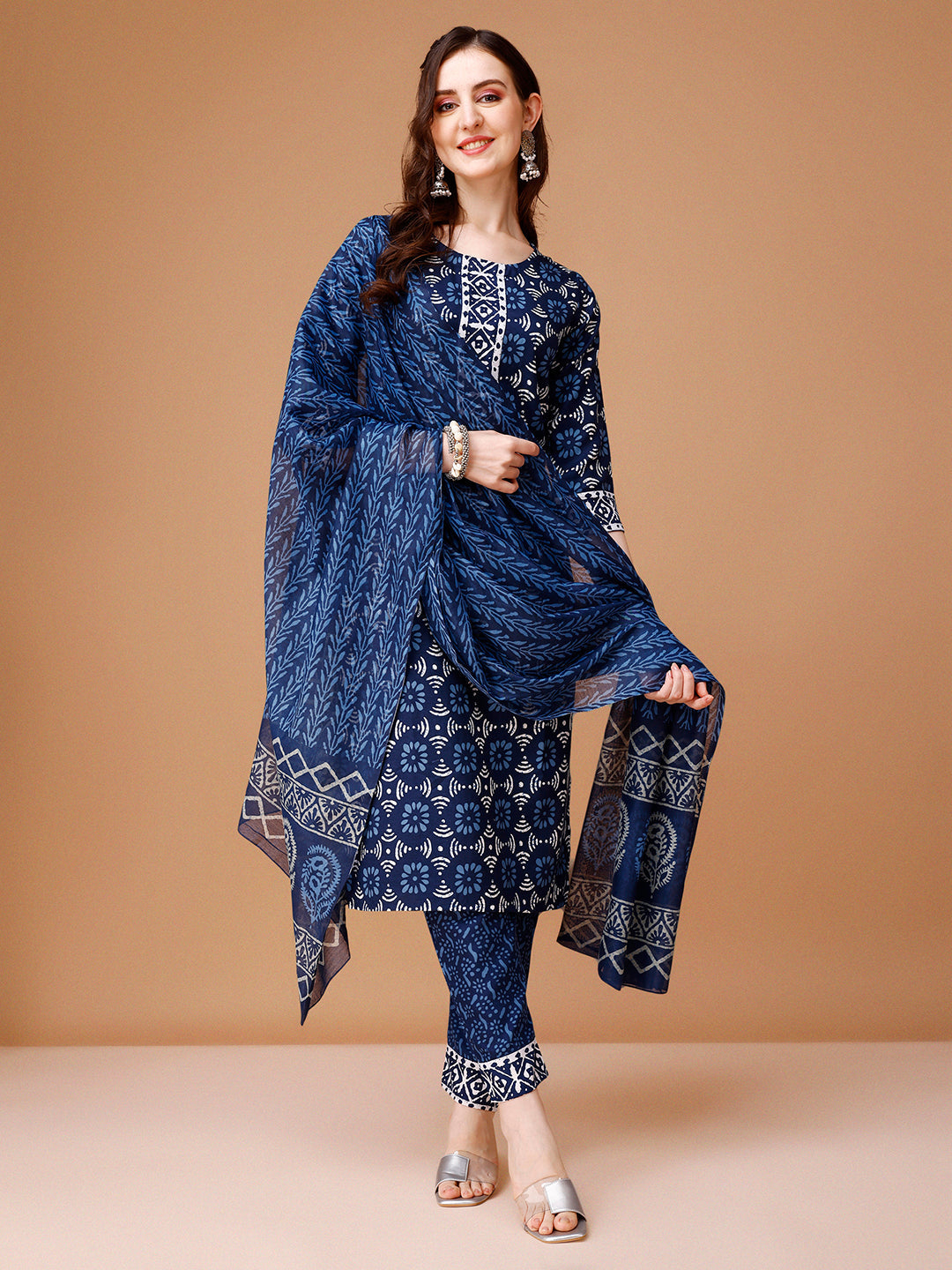 Woman wearing a multicolor printed rayon kurta set with coordinated pants and dupatta