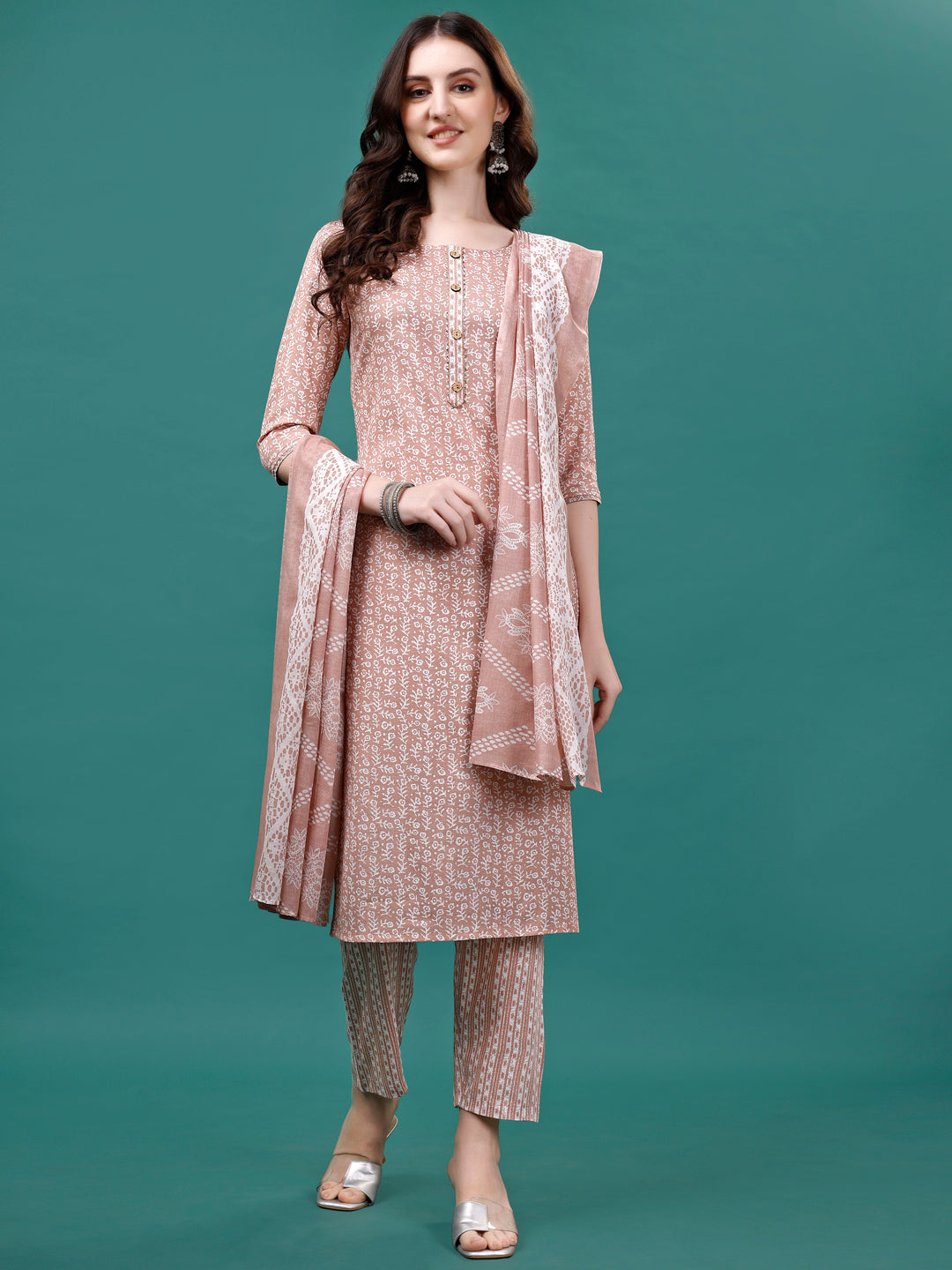 Woman wearing a multicolor floral printed kurta set with matching pant and dupatta