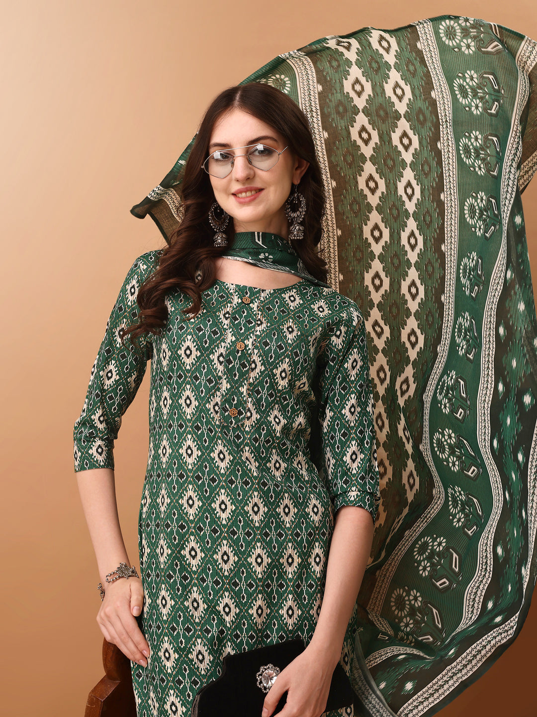 Green cotton kurta set with ethnic motif prints and a matching dupatta