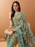 Elegant green floral printed cotton kurta set with matching pants and dupatta.