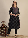 Black printed rayon kurta set with 3/4th sleeves, matching pants, and printed dupatta.