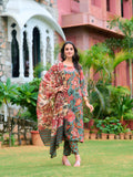 Woman wearing a green printed rayon kurta set with matching dupatta and pant