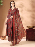 Rust flared kurta with ethnic motif print, matching palazzo pants, and dupatta