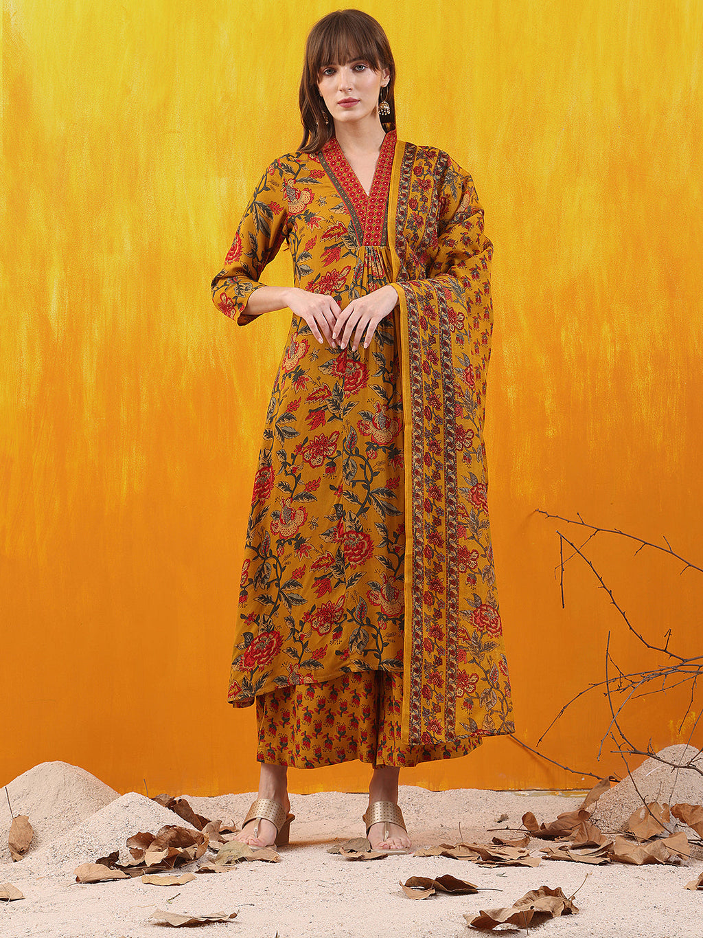 Mustard floral printed A-line kurta set with matching palazzo and dupatta in soft rayon fabric