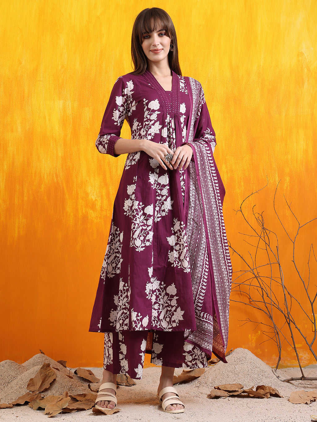 Purple flared kurta with embroidery and prints, including pant and dupatta