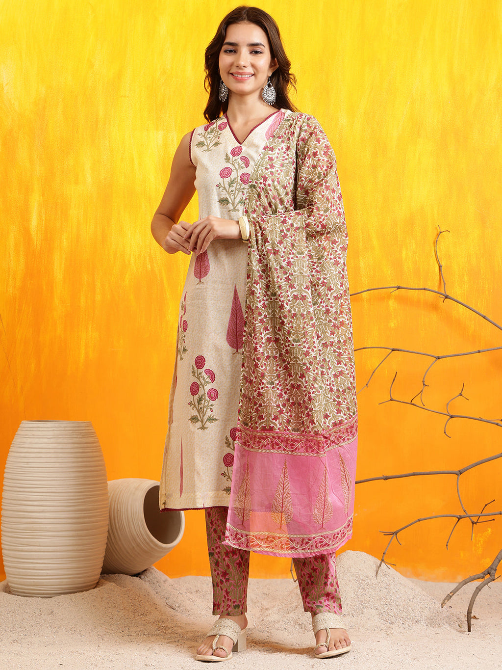 Pink kurta set featuring ethnic motif prints with matching pants and printed dupatta.