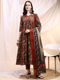 Rust colored Angarkha style Anarkali kurta with paisley print, matching pants, and dupatta.