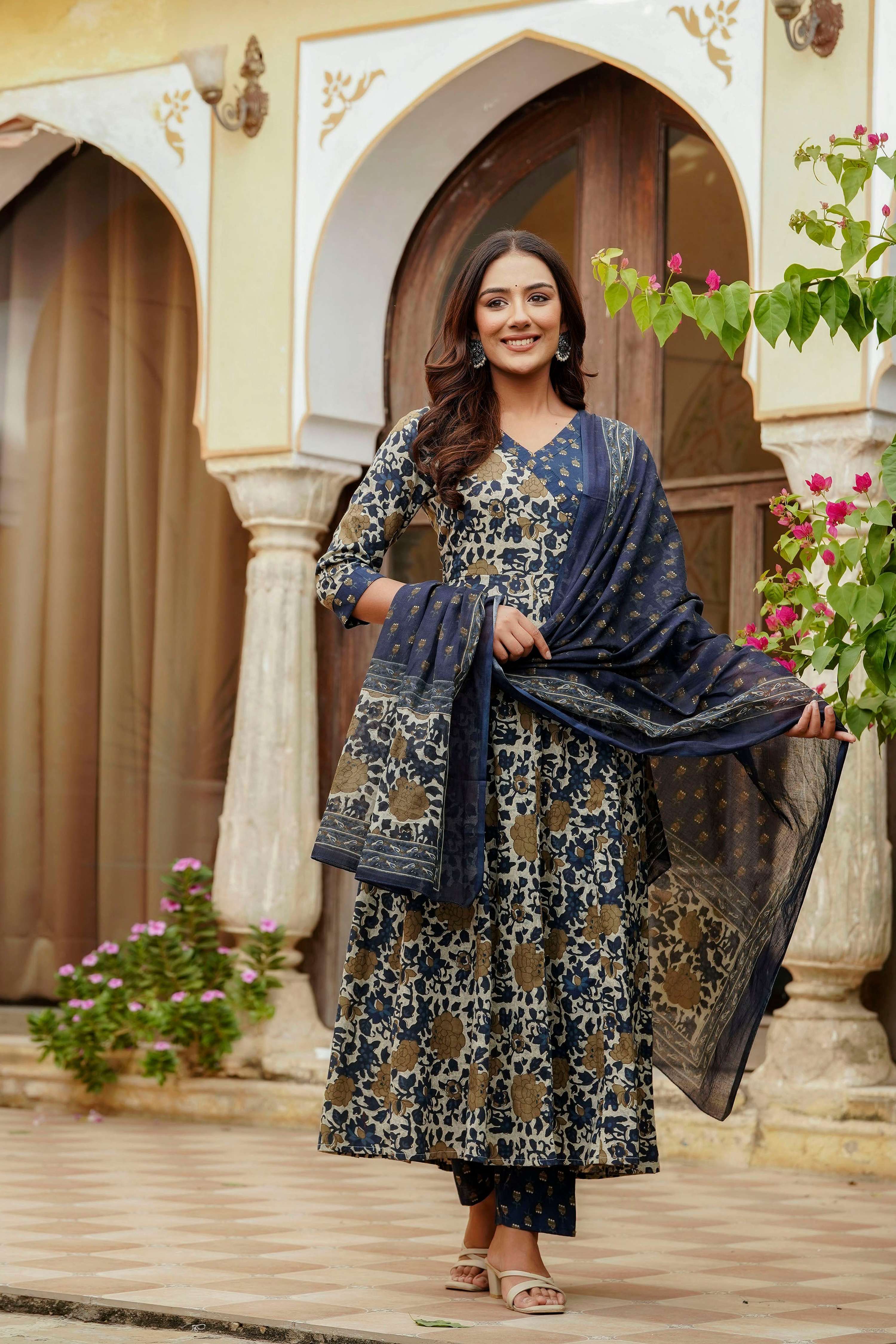 Blue Angarkha style cotton kurta set with floral prints and embroidery.