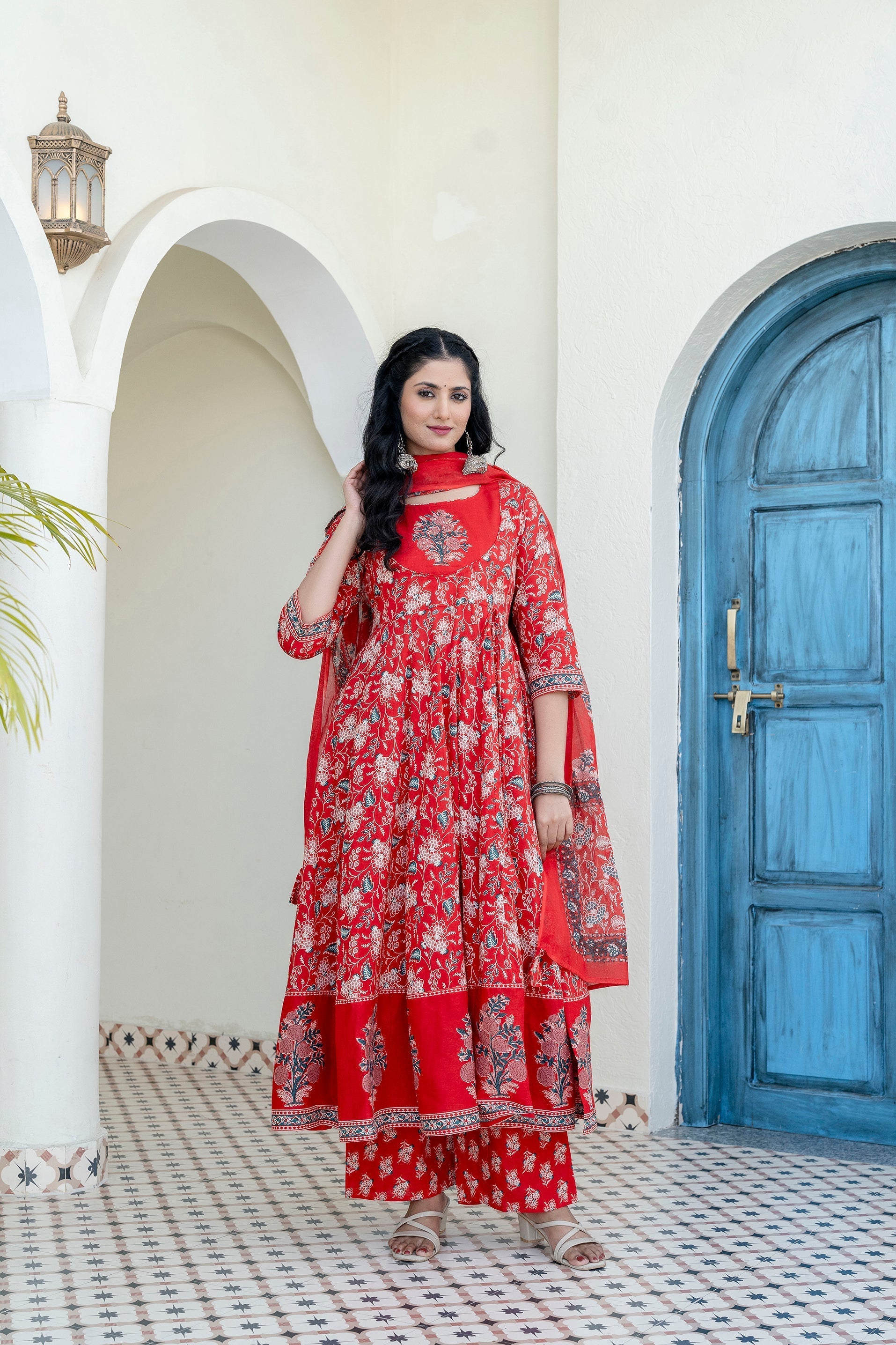 Red Anarkali kurta with floral print and embroidery, paired with palazzo and dupatta