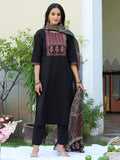 Black cotton kurta with ethnic prints and embroidery, worn with matching pants and a printed dupatta.