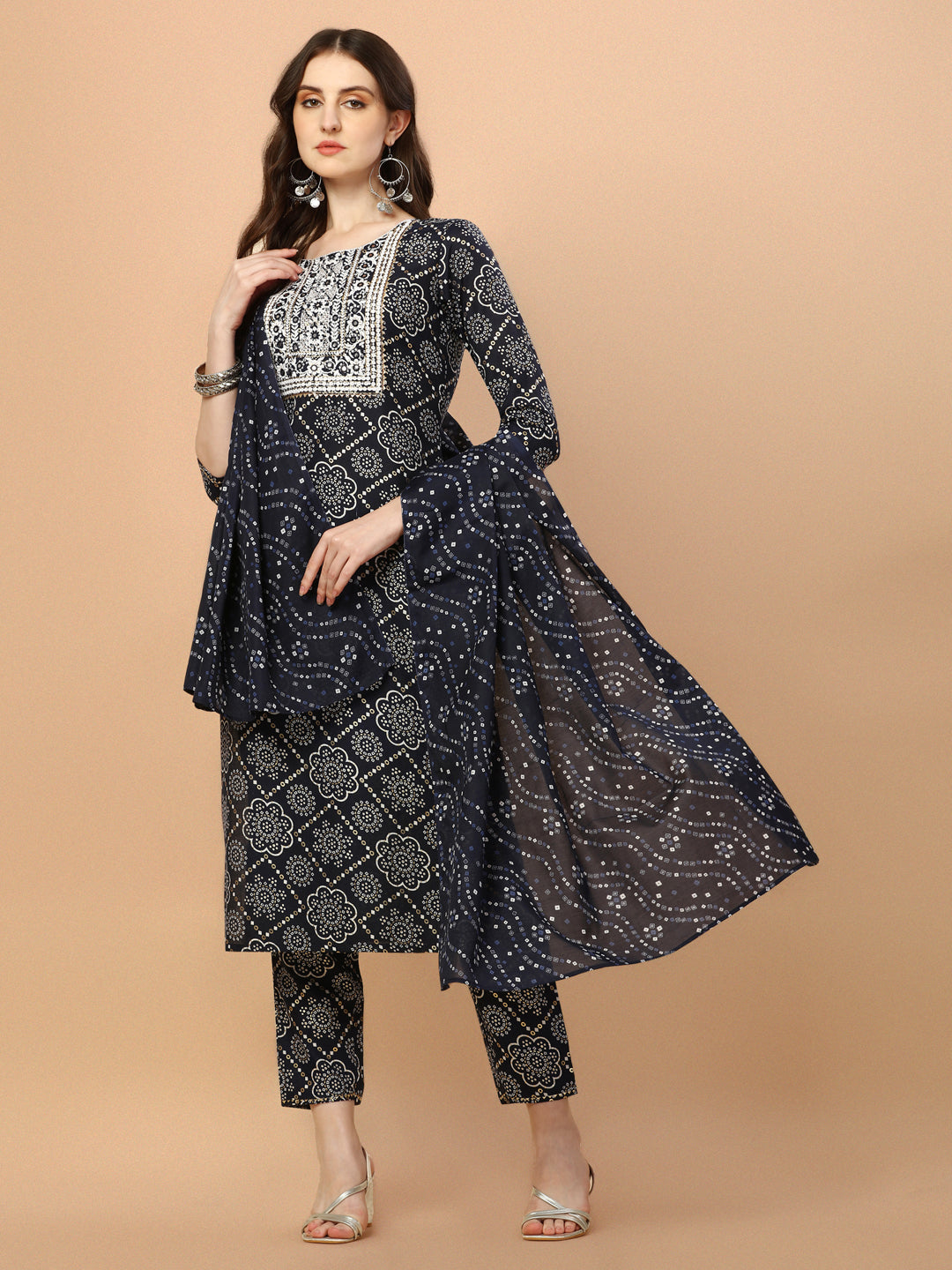 Multicolor Bandhani printed and embroidered kurta set with matching pants and dupatta.