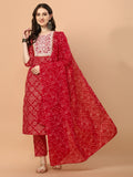 Woman wearing a multicolor Bandhani printed and embroidered rayon kurta set with pant and dupatta.