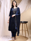 Navy blue velvet kurta with hand embroidery, paired with matching pants and a dupatta.